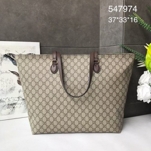 Gucci GG Supreme canvas medium draagtas 547974 bruin