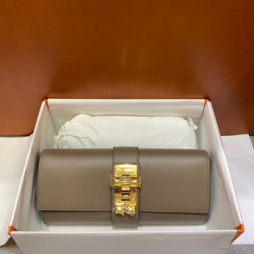 Hermes H Medor swift lederen clutch 37566 grijze en gouden hardware