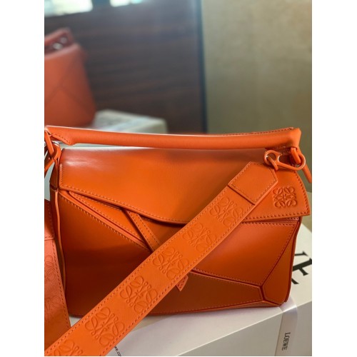 Loewe Puzzeltas Leer 1209 oranje