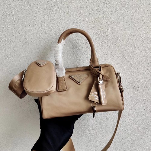 Prada Re-Edition 2005 top-handvat tas 1PR846 abrikoos